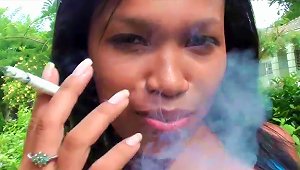 Ebony Is Smoking A Cigarette