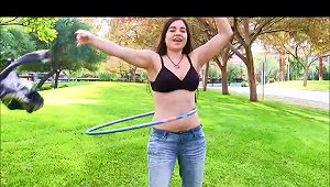 Slightly  Brunette Teen Plays With A Hula Hoop Naked