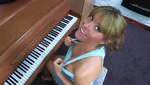 Sexy Blonde Talia Is Playing On Piano